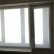Рулонные шторы на балконный блок с боковой фиксацией